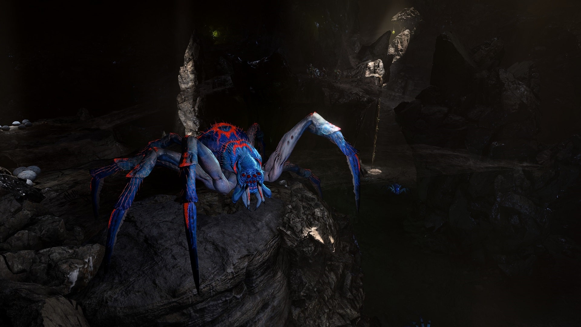 Dargestellt ist ein Screenshot aus dem Videospiel Baldur's Gate 3. Zu sehen ist eine gigantische Spinne, die in einer Höhle sitzt. Im Hintergrund ist eine Gruppe Abenteurer zu sehen. Die Benutzeroberfläche des Spiels ist ausgeblendet.