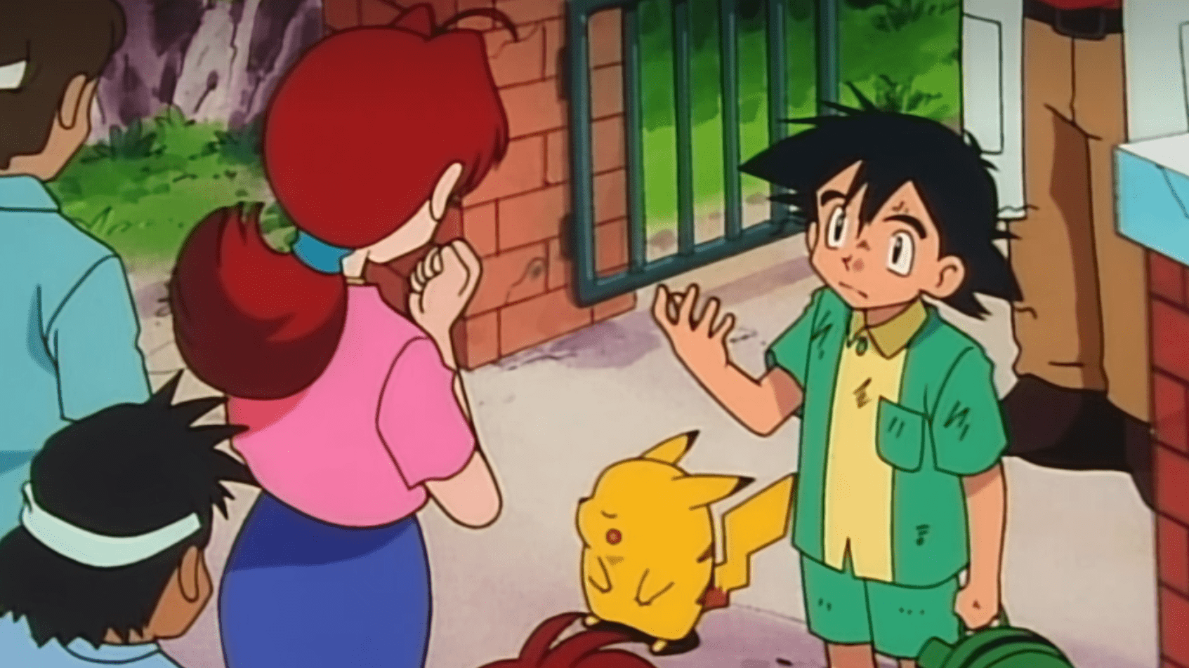 Dargestellt ist ein Screenshot aus dem erste Pokémon Anime Indigo League. Zu sehen ist der jungte Ash, der gerade sein Pikachu erhalten hat. Pikachu weigert sich in dieser Szene in seinen Pokéball zu gehen. 