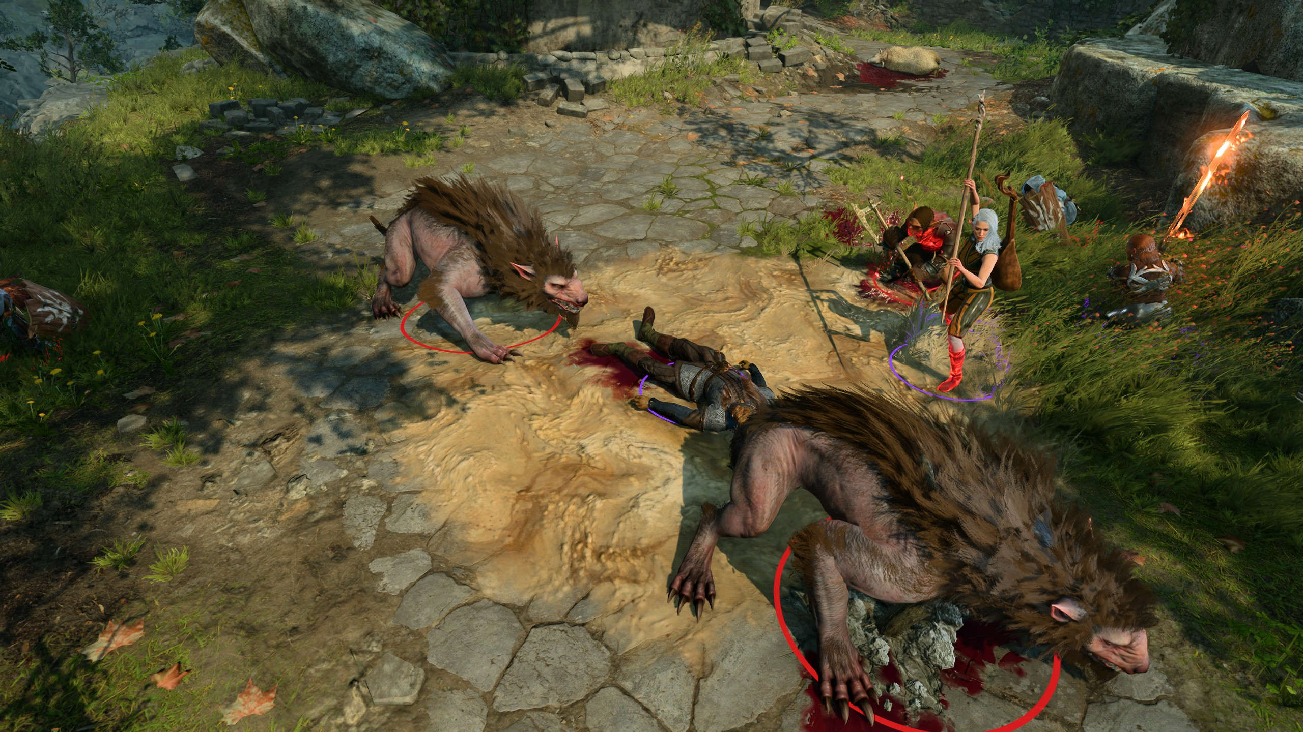 Screenshot aus Baldur's Gate 3. Zu sehen ist eine Heldengruppe im Kampf gegen Goblins und Worge. Ein Halbork liegt am Boden, während ein Halbling und eine Elfe zur Rettung eilen. 
